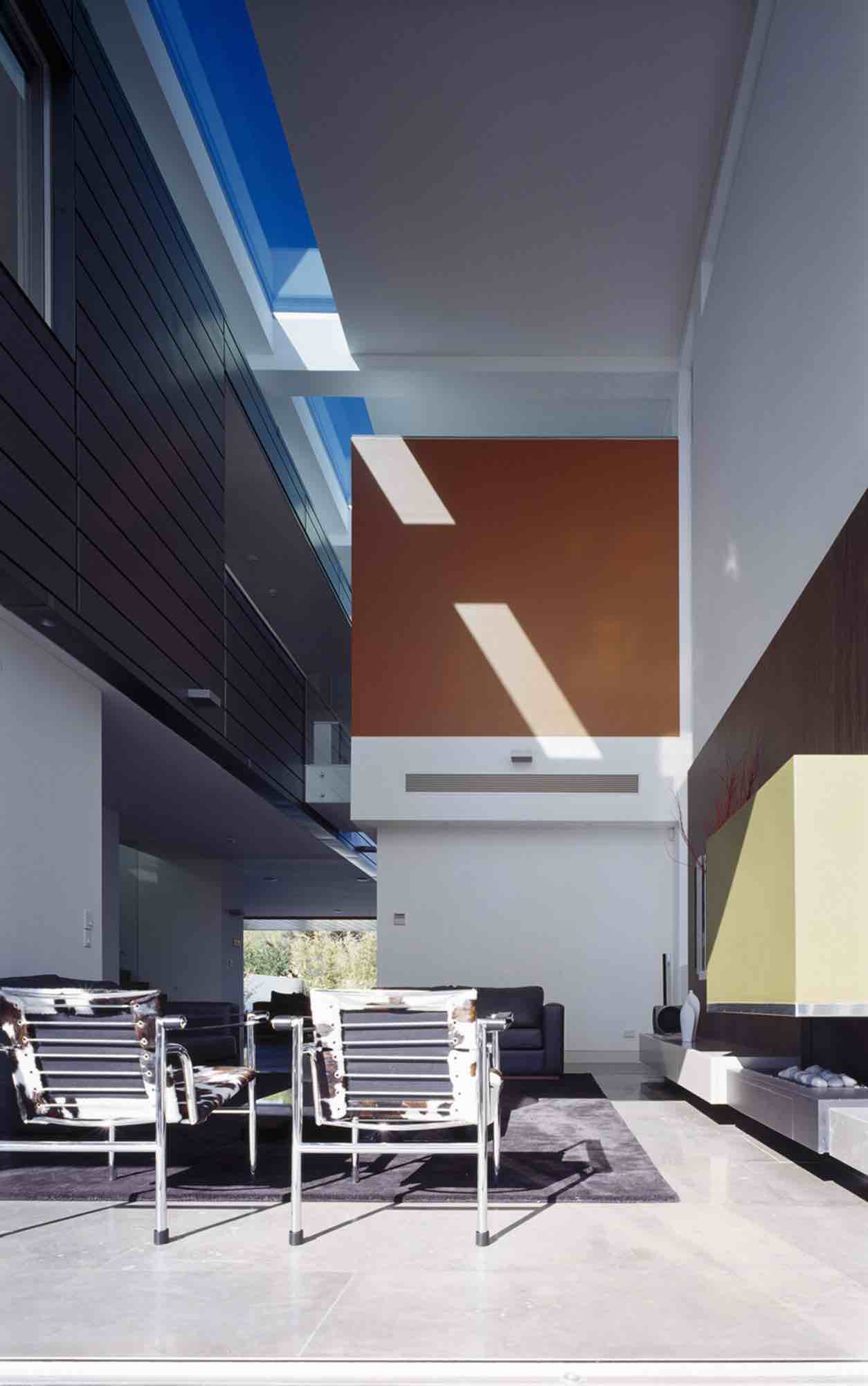 minosa-design-high-voids-sitting-room-modern-custom-joinery-gas-fireplace-limestone-floor-01