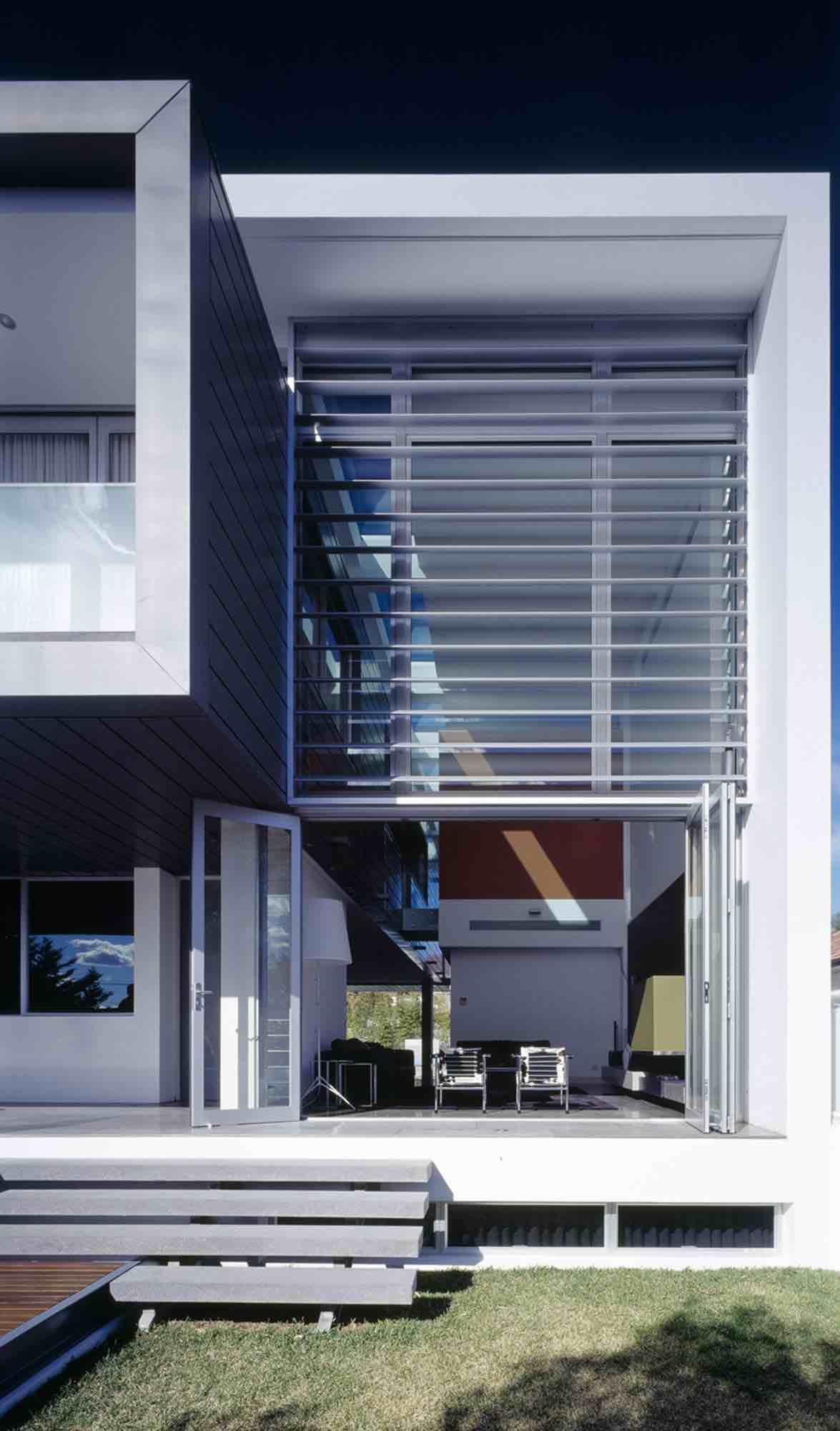 minosa-design-high-voids-sitting-room-modern-custom-joinery-gas-fireplace-limestone-floor-06