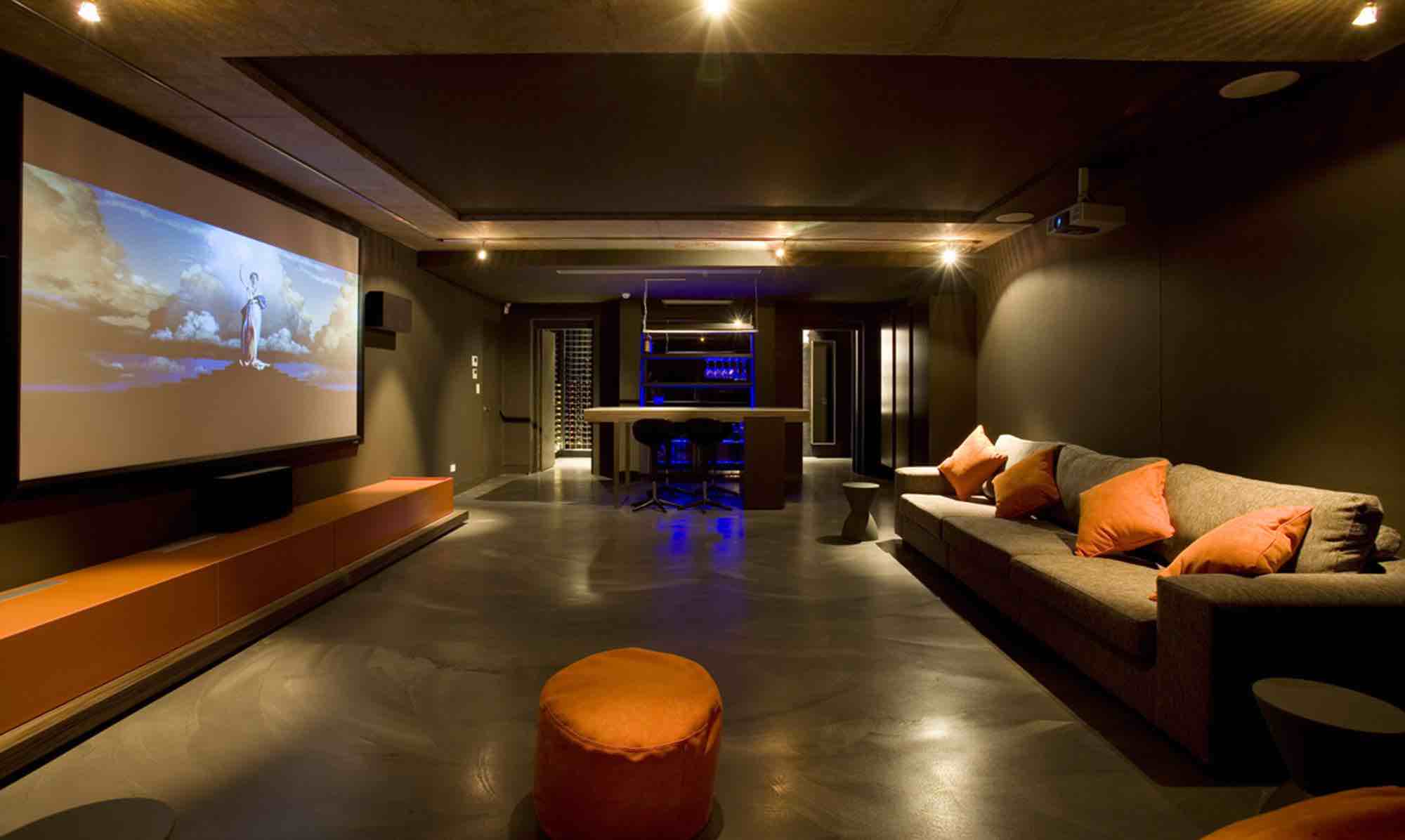 minosa-design-home-theatre-design-dark-kitchenette-led-exposed-orange-concrete-0
