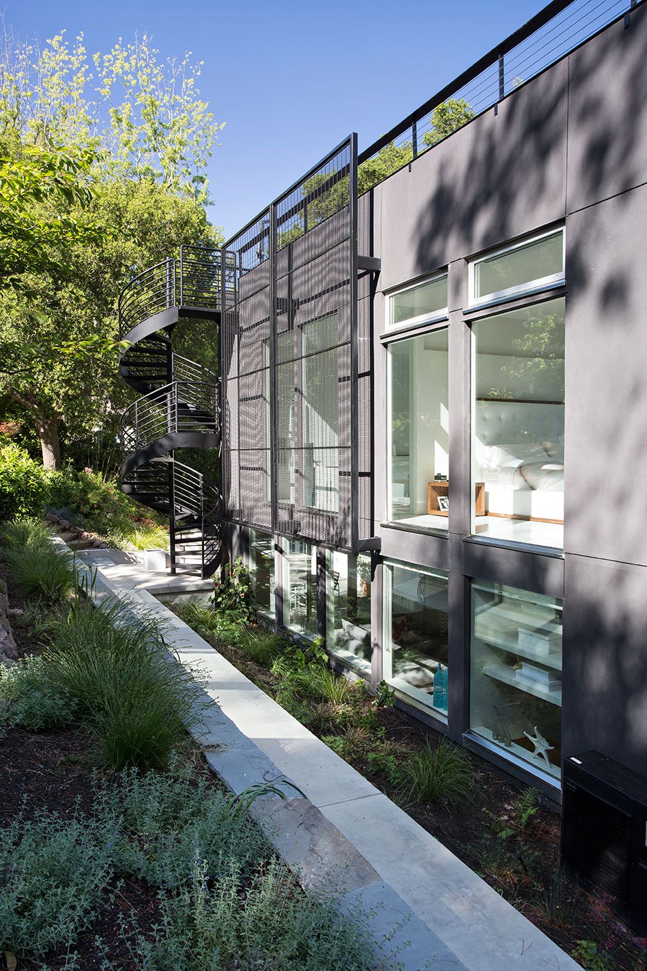 Minimal Modern Addition Home with Dark Grey Stuccoed Walls by Klopf Architecture-02