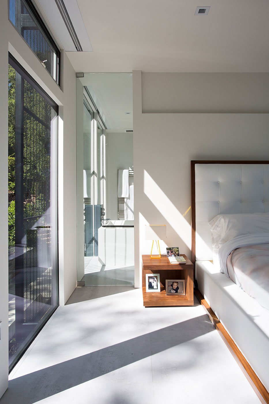 Minimal Modern Addition Home with Dark Grey Stuccoed Walls by Klopf Architecture-15
