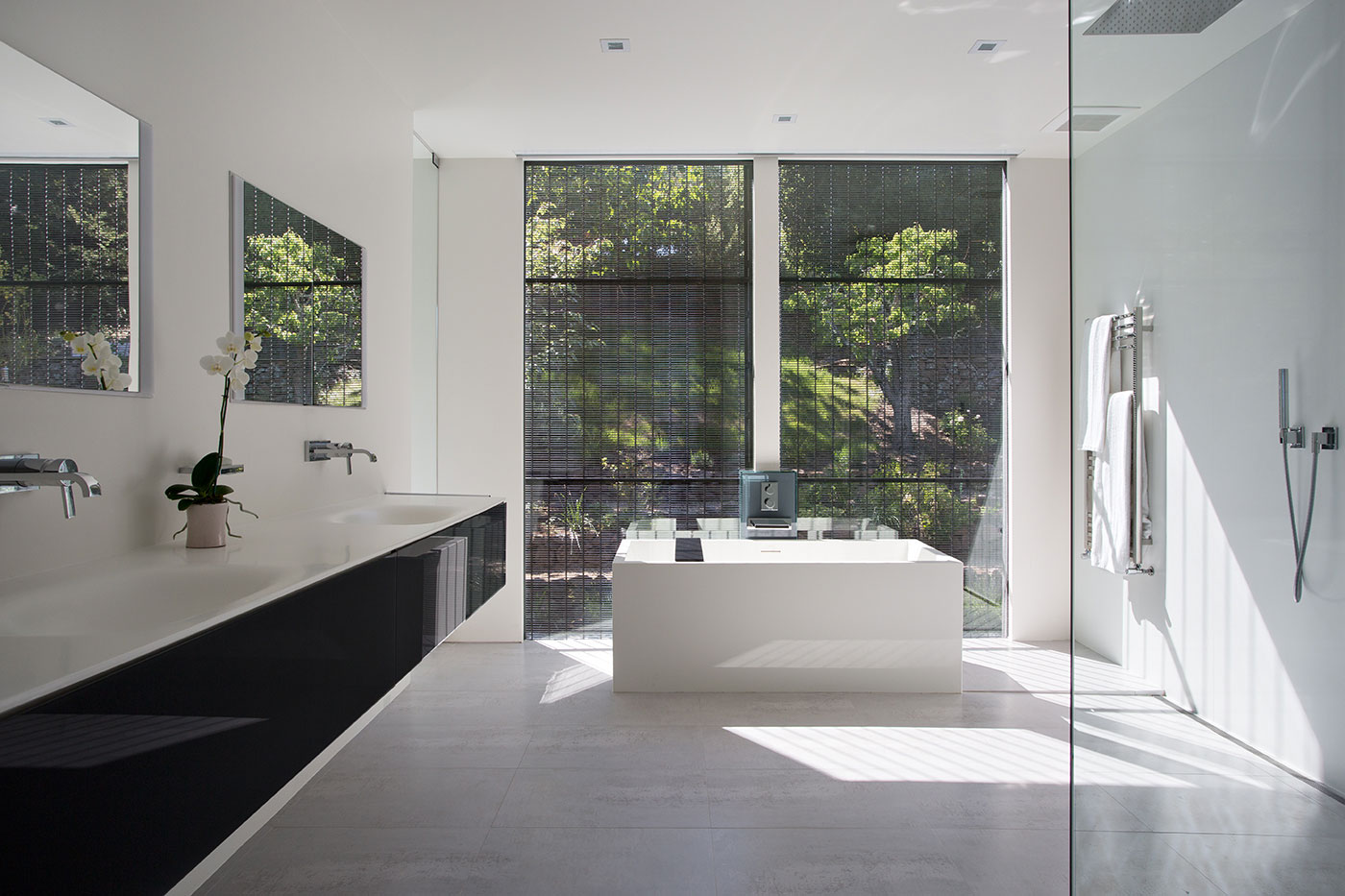 Minimal Modern Addition Home with Dark Grey Stuccoed Walls by Klopf Architecture-18