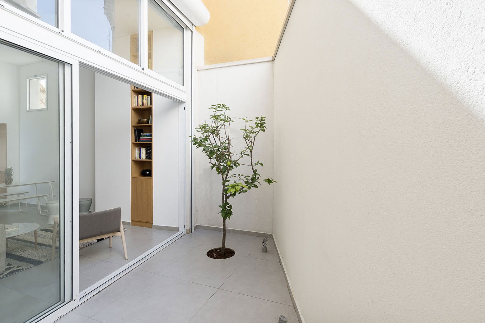 Adjusting a Mish-Mash of Small Rooms and Corridors into Jaffa Garden Apartment by Itai Palti-01