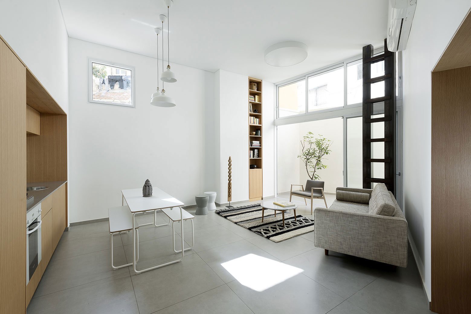 Adjusting a Mish-Mash of Small Rooms and Corridors into Jaffa Garden Apartment by Itai Palti-03
