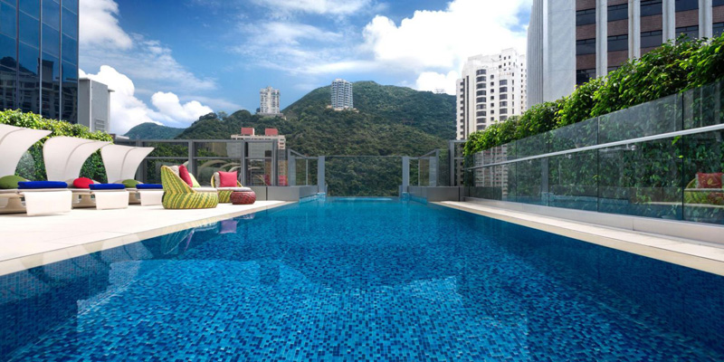 Aedas designed the Hotel Indigo in Hong Kong with a swimming pool that hangs out over the edge of the building-06