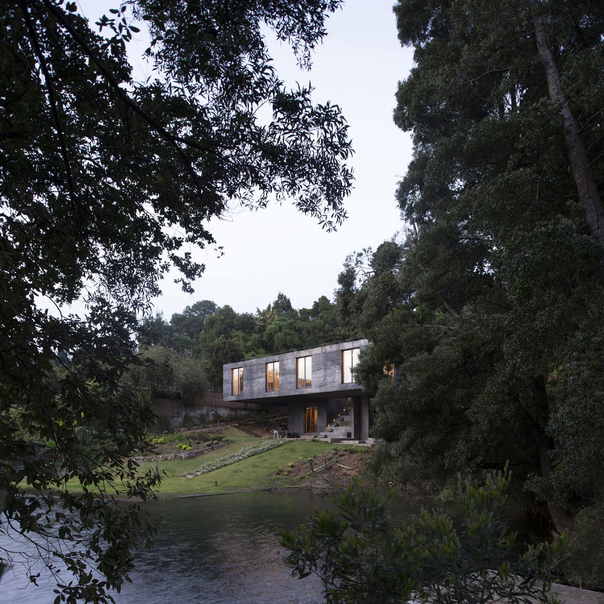 Guna House Located Between a Steeply Sloping Hillside and a Wood of Eucalyptus Trees by Pezo von Ellrichshausen-02