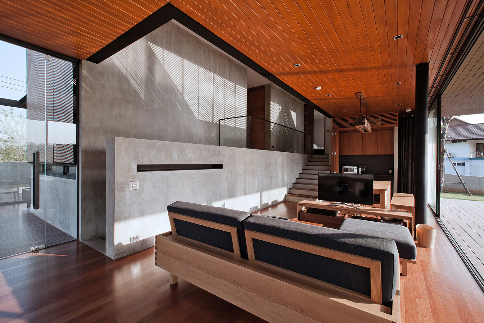 living room made by concrete and wood