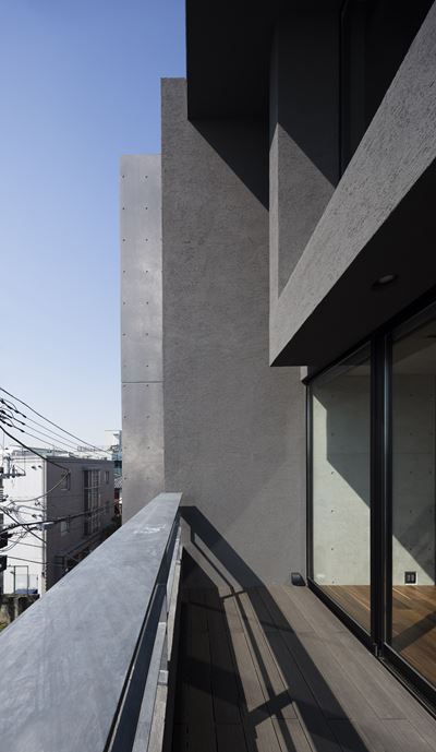 OKM 4 story building designed for a private residence and apartment in Tokyo by Artechnic-18