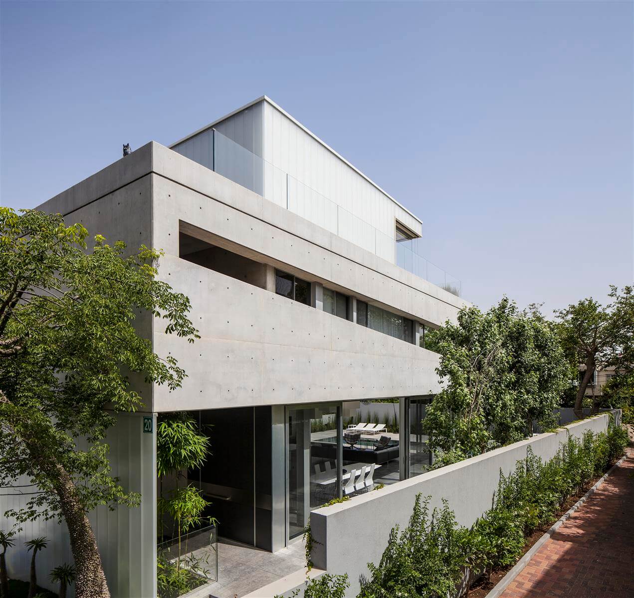 The Concrete Cut House in Ramat Gan by Pitsou Kedem Architects-05
