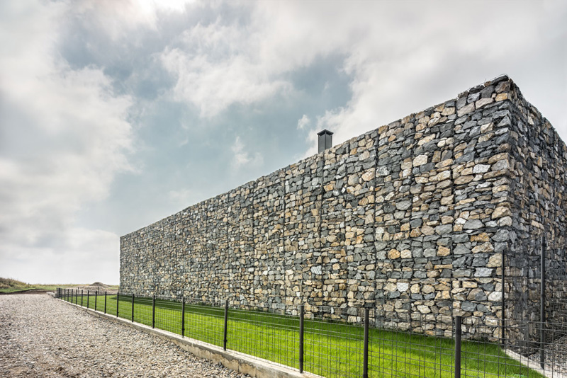 Walls made of gabion and awesome 360 degree views of Observation house by I O architects-01