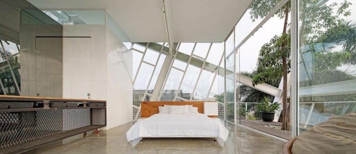 Small-Slanted-House-in-Jakarta-by-Budi-Pradono-Architects-06
