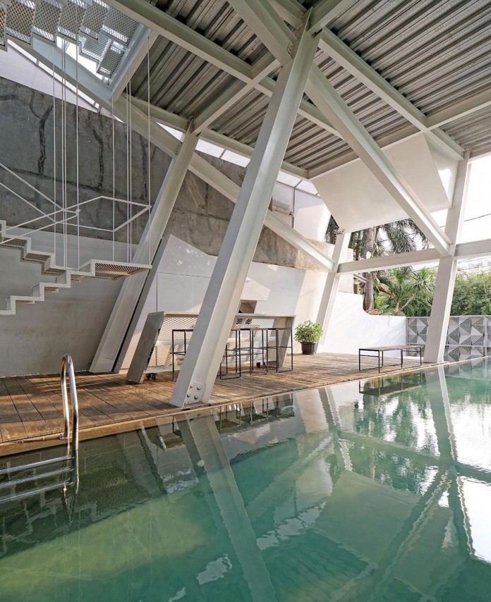 Small-Slanted-House-in-Jakarta-by-Budi-Pradono-Architects-11