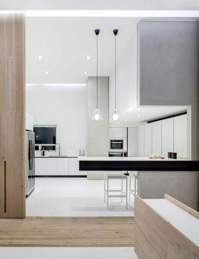 gh-mild-clean-apartment-light-toned-wood-white-stone-black-metalwork-archetonic-07