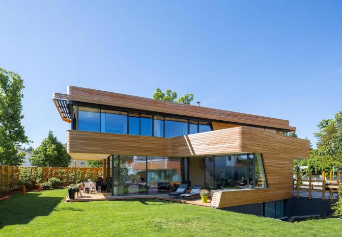 holistic-living-eco-friendly-wooden-single-family-house-two-semi-detached-houses-graft-01