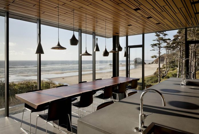 360-house-perched-beach-edge-tree-line-bora-architects-21