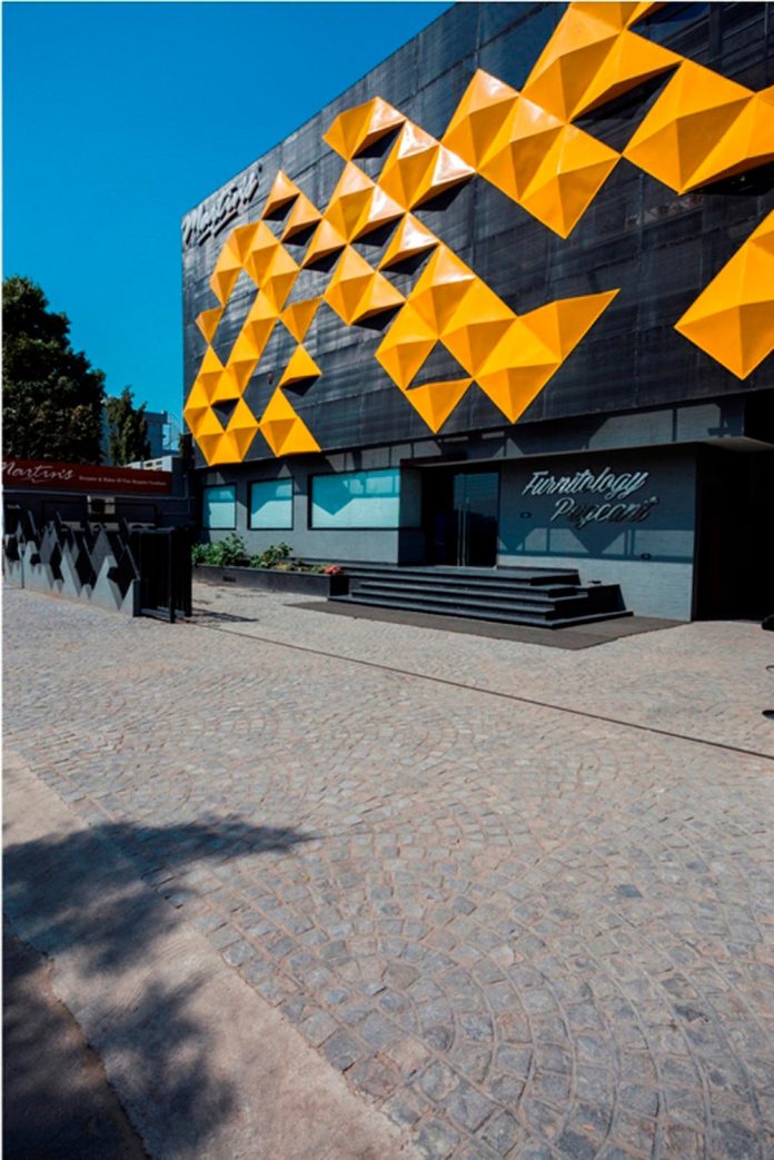 martins-dazzling-yellow-panels-facade-furniture-factory-designed-studio-ardete-03