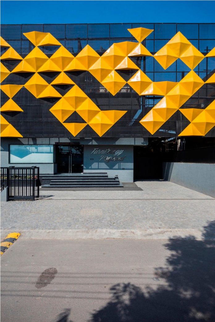 martins-dazzling-yellow-panels-facade-furniture-factory-designed-studio-ardete-06