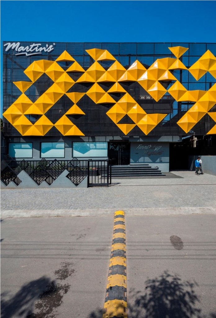 martins-dazzling-yellow-panels-facade-furniture-factory-designed-studio-ardete-07