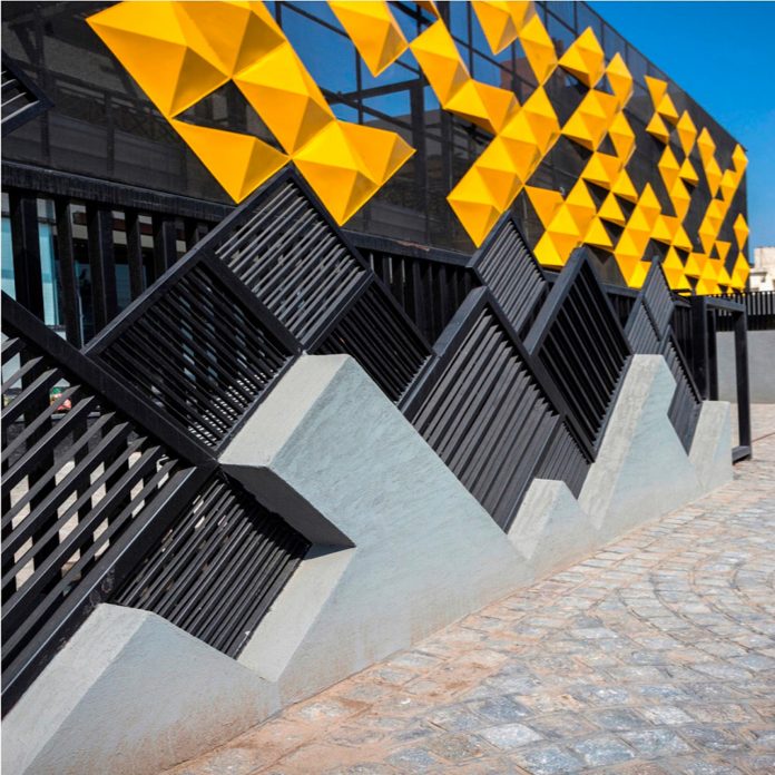 martins-dazzling-yellow-panels-facade-furniture-factory-designed-studio-ardete-10