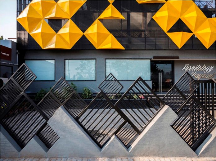 martins-dazzling-yellow-panels-facade-furniture-factory-designed-studio-ardete-11
