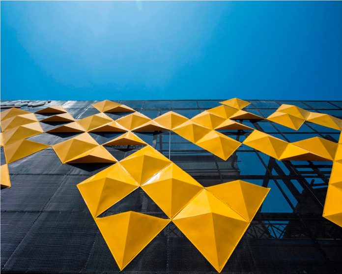 martins-dazzling-yellow-panels-facade-furniture-factory-designed-studio-ardete-14