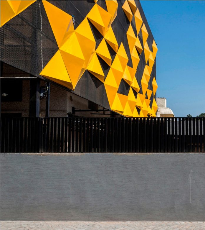 martins-dazzling-yellow-panels-facade-furniture-factory-designed-studio-ardete-19