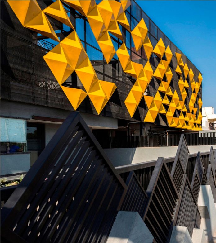 martins-dazzling-yellow-panels-facade-furniture-factory-designed-studio-ardete-20