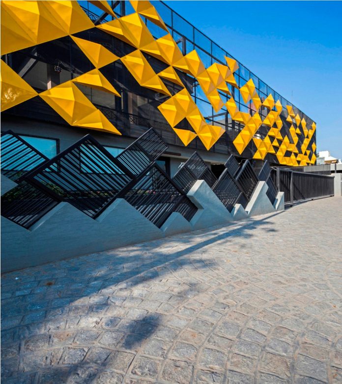 martins-dazzling-yellow-panels-facade-furniture-factory-designed-studio-ardete-22