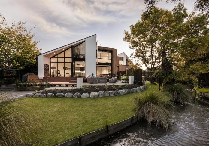 cymon-allfrey-architects-design-two-family-homes-make-beautiful-outlook-towards-wairarapa-stream-urban-christchurch-02