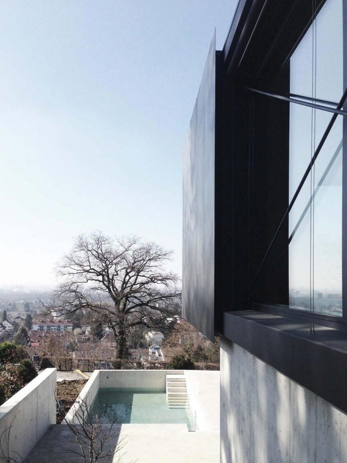 modern-house-riehen-made-glass-concrete-wood-metal-serve-designed-reuter-raeber-architects-03
