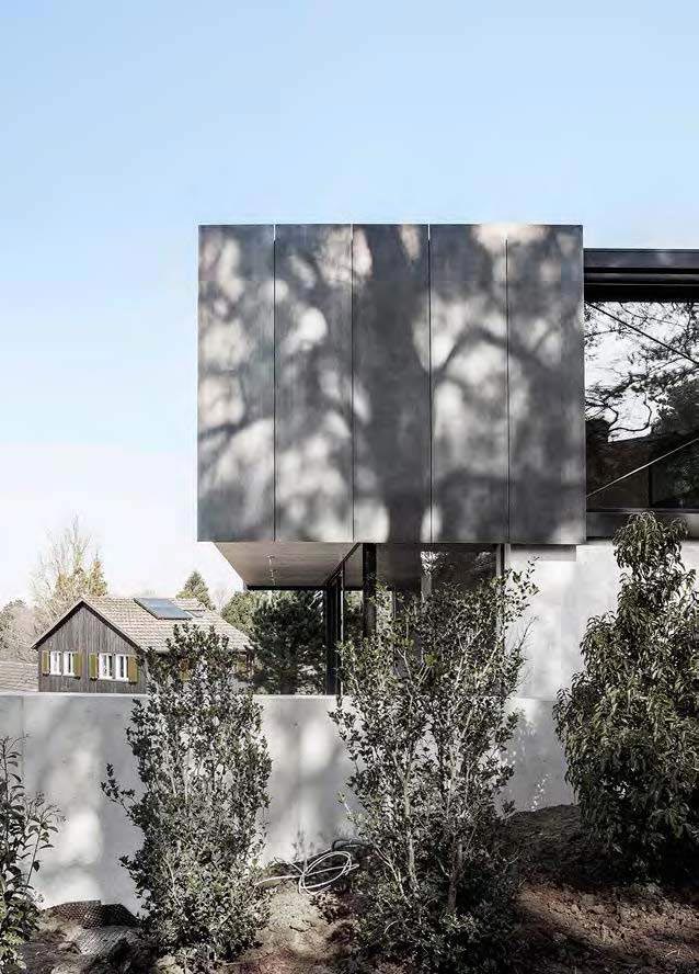 modern-house-riehen-made-glass-concrete-wood-metal-serve-designed-reuter-raeber-architects-04
