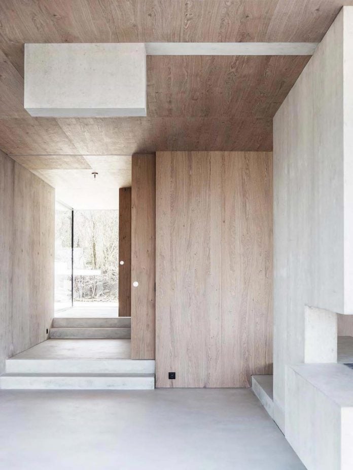 modern-house-riehen-made-glass-concrete-wood-metal-serve-designed-reuter-raeber-architects-07