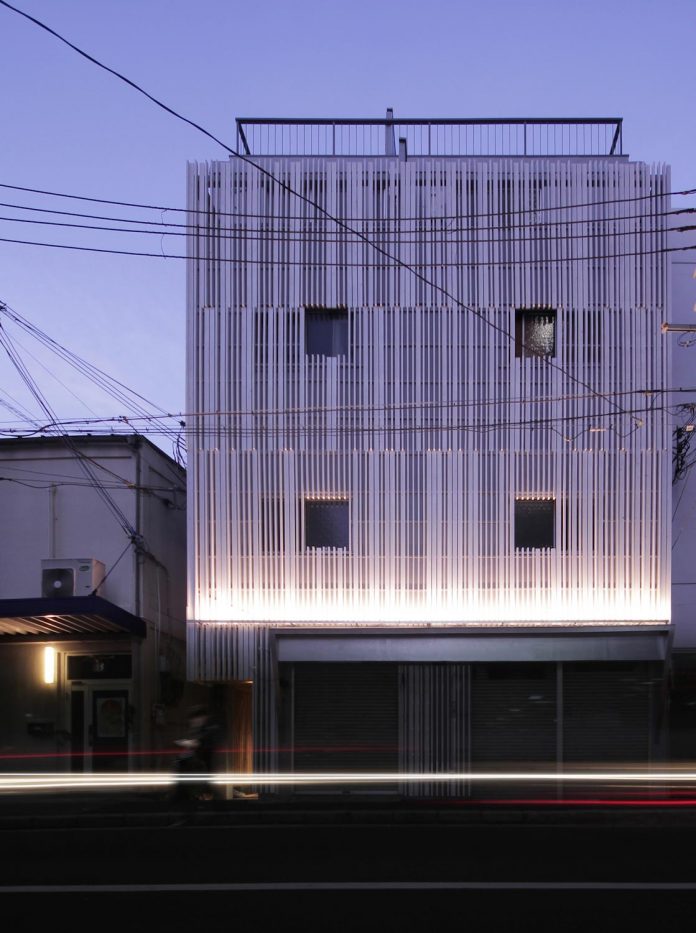 renovation-39-year-old-structure-contemporary-building-facade-white-fins-conceal-two-stores-01