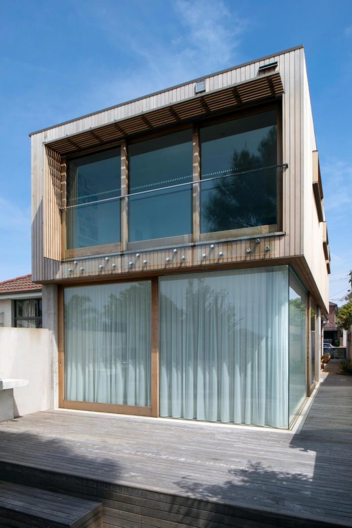 timber-box-home-sits-top-glass-box-renovation-sydney-02