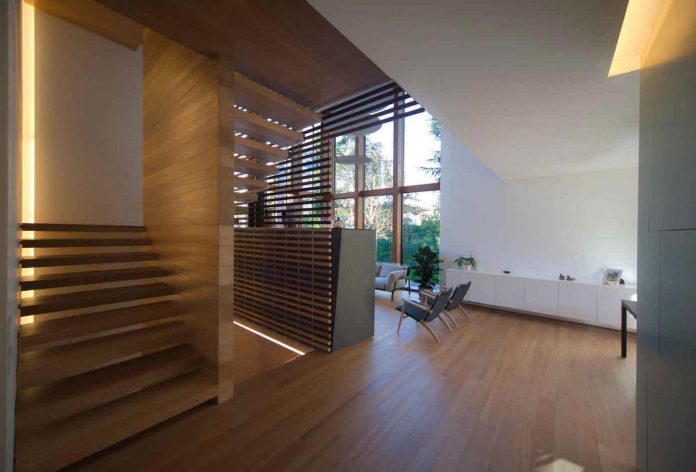 twin-house-consists-two-cubic-volumes-mounted-concrete-basement-designed-studiopietropoli-05