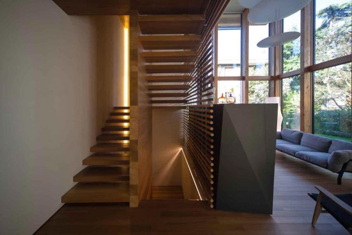 twin-house-consists-two-cubic-volumes-mounted-concrete-basement-designed-studiopietropoli-06