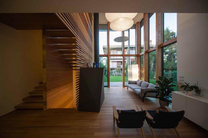 twin-house-consists-two-cubic-volumes-mounted-concrete-basement-designed-studiopietropoli-08
