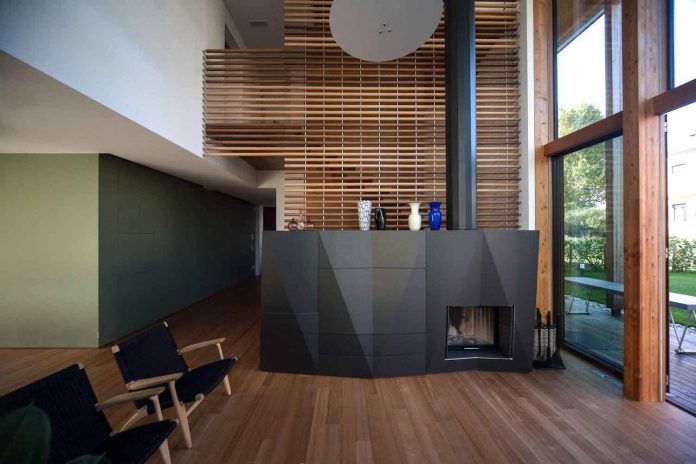 twin-house-consists-two-cubic-volumes-mounted-concrete-basement-designed-studiopietropoli-12