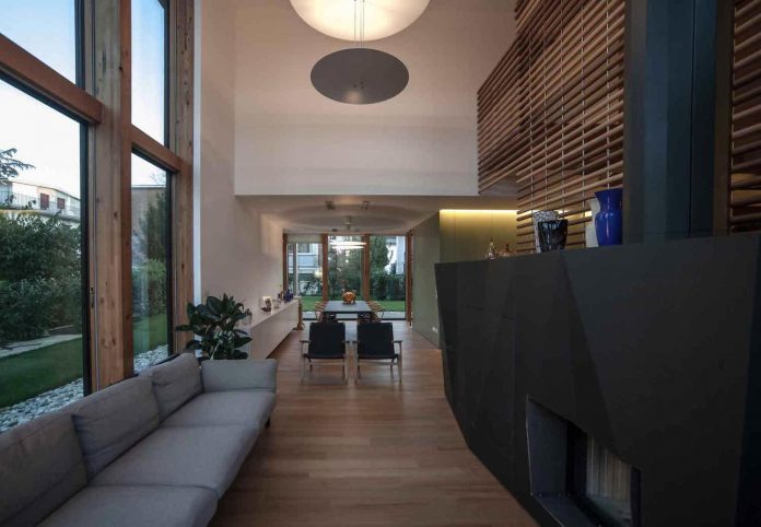 twin-house-consists-two-cubic-volumes-mounted-concrete-basement-designed-studiopietropoli-13