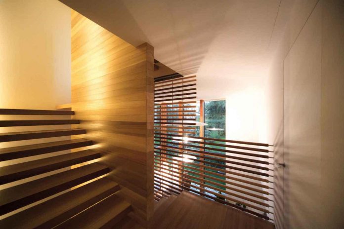 twin-house-consists-two-cubic-volumes-mounted-concrete-basement-designed-studiopietropoli-16