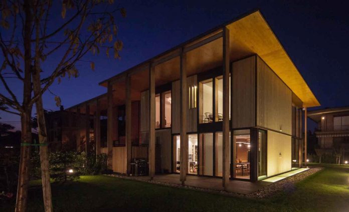 twin-house-consists-two-cubic-volumes-mounted-concrete-basement-designed-studiopietropoli-23