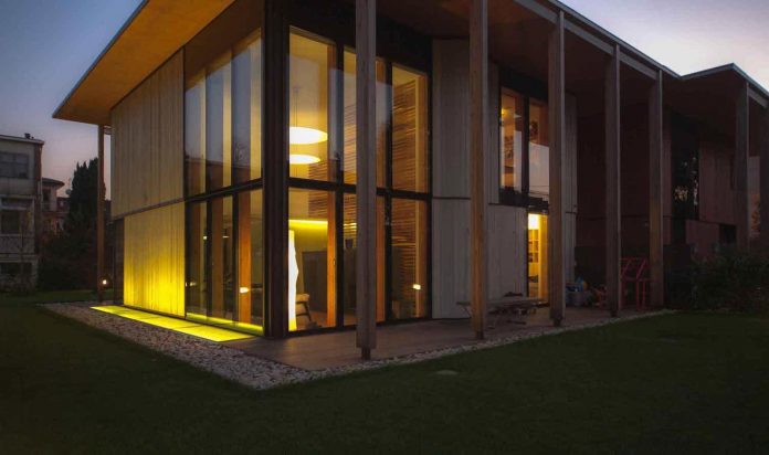 twin-house-consists-two-cubic-volumes-mounted-concrete-basement-designed-studiopietropoli-27