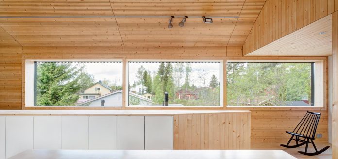 wooden-building-situated-traditional-residential-area-kivistonmaki-built-architects-family-16