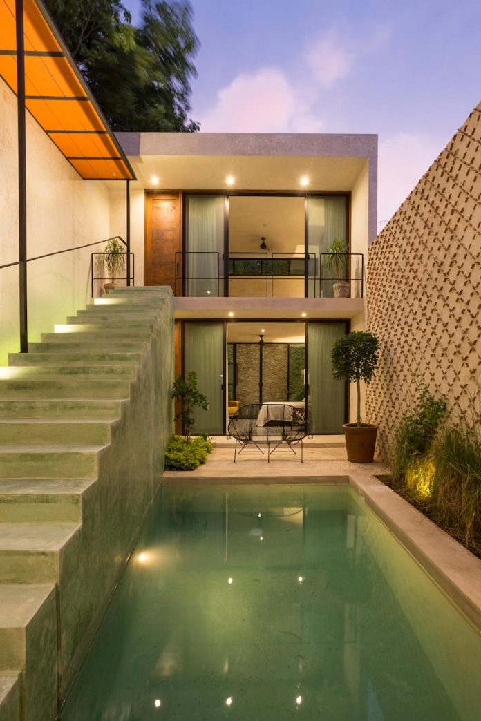 casa-del-limonero-house-two-floors-divided-two-central-courtyard-15