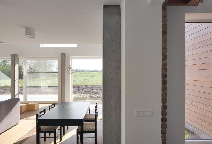 former-farmhouse-conversion-contemporary-pitched-roof-house-two-chimney-shaped-skylights-15