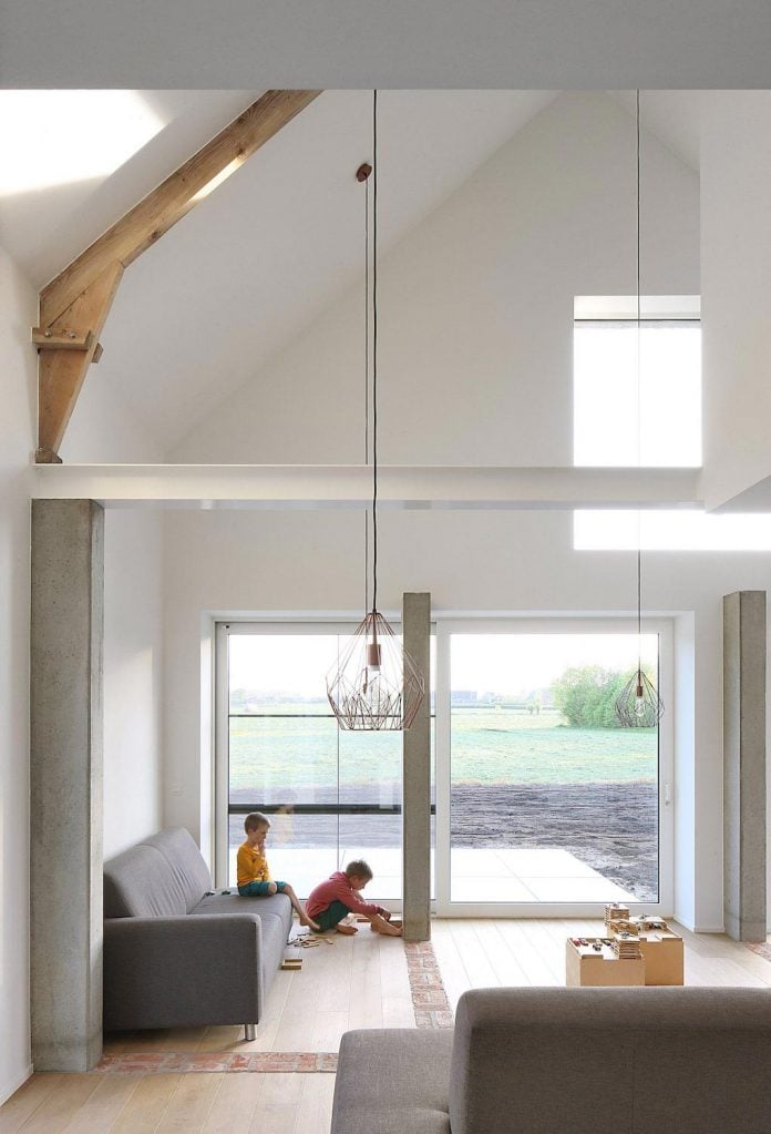former-farmhouse-conversion-contemporary-pitched-roof-house-two-chimney-shaped-skylights-18