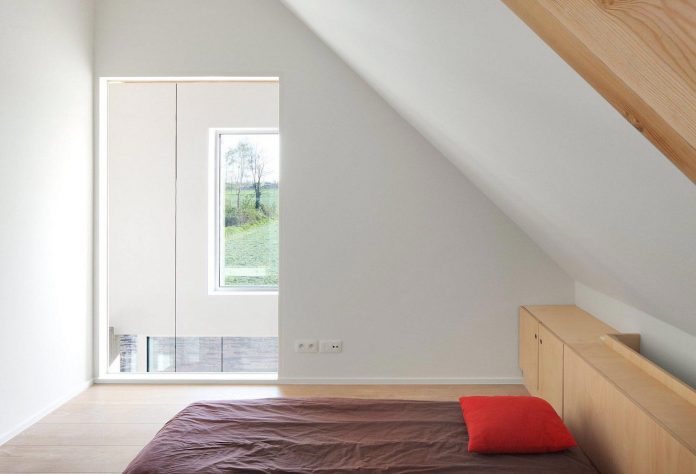 former-farmhouse-conversion-contemporary-pitched-roof-house-two-chimney-shaped-skylights-25