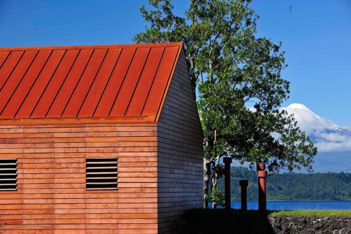 maiten-holiday-residence-situated-shores-llanquihue-lake-featuring-wooden-facades-red-metal-roofs-10