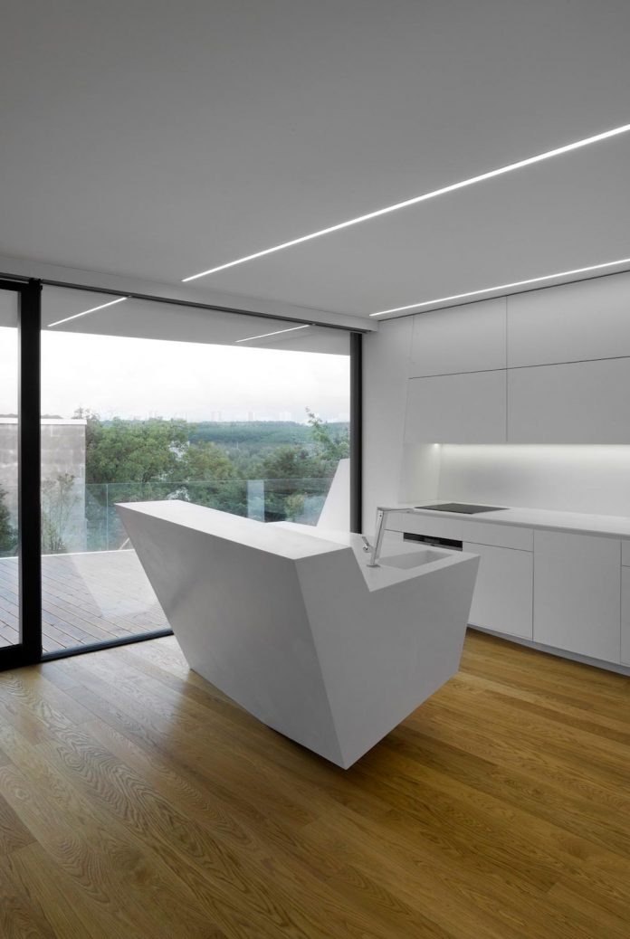 minimalist-home-design-located-south-sloping-plot-residential-part-prague-08