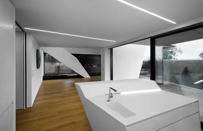 minimalist-home-design-located-south-sloping-plot-residential-part-prague-09